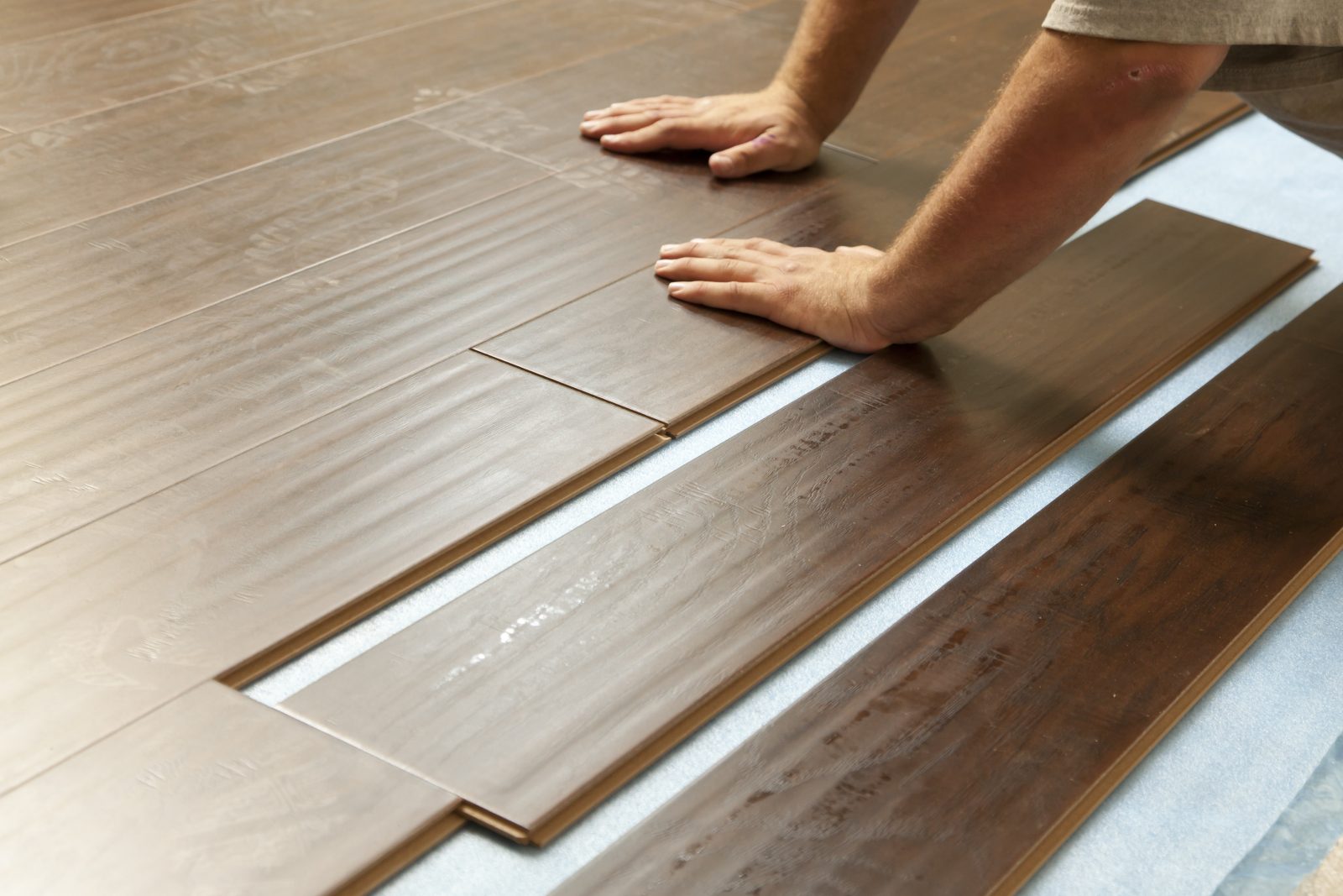 Man Installing New Laminate | Bram Flooring