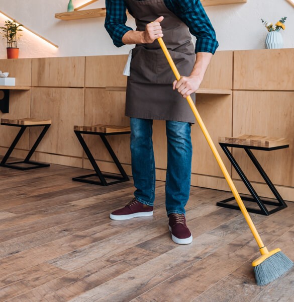 Sweeping hardwood flooring | Bram Flooring